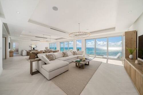 Luxury Condo | Living area | 65-inch Smart TV with cable channels, TV, Netflix