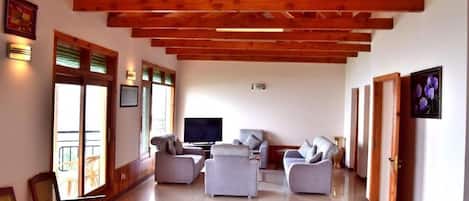 Standard Apartment | Living room | 32-inch LCD TV with cable channels, TV