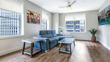 Design Condo, 1 Queen Bed with Sofa bed | Living area | 55-inch Smart TV with satellite channels, TV, Netflix