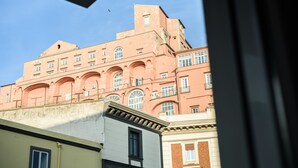 A multi-story building with arched windows and a flat roof. - Via Niccolò Tommaseo 4 - appartamento 2 (Napoli)
