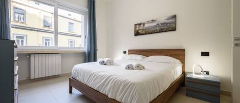 2 عدّة غرف نوم ومكواة/لوح كي وواي فاي مجانًا وملاءات أسرّة