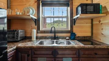 Fridge, microwave, stovetop, coffee/tea maker