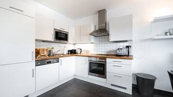 Apartemen | Dapur pribadi | Lemari es, microwave, oven, dan kompor