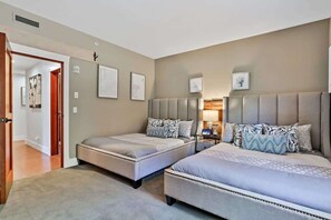 2 bedrooms, desk, iron/ironing board, travel crib