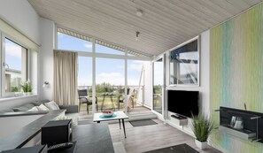 Télévision, cheminée, lecteur de DVD, chaîne hi-fi