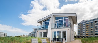"Experience Coastal Bliss in Our Charming Ferienhaus Herzmuschel!"