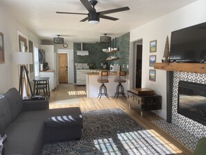 Smart TV, fireplace, DVD player, books