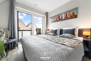 3 slaapkamers, een strijkplank/strijkijzer, reisbedje, gratis wifi