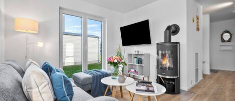 Télévision, cheminée, vidéothèque