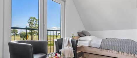 3 slaapkamers, een strijkplank/strijkijzer, reisbedje, gratis wifi