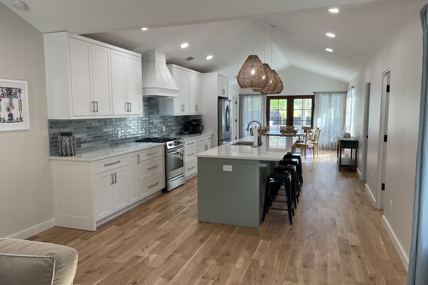 BRAND NEW Kitchen, gas stove, large refrigerator, microwave, ample counter space