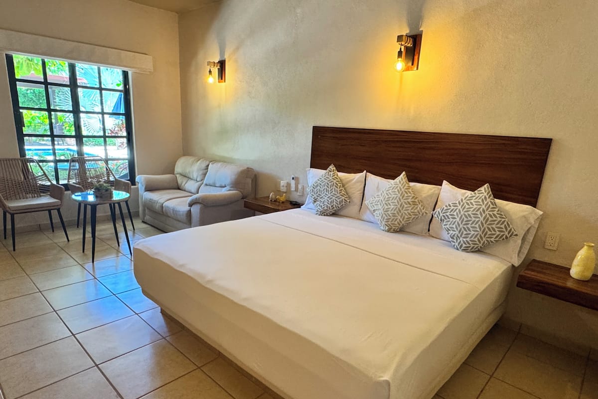 Comfort Double Room, Pool View | In-room safe, iron/ironing board, free WiFi