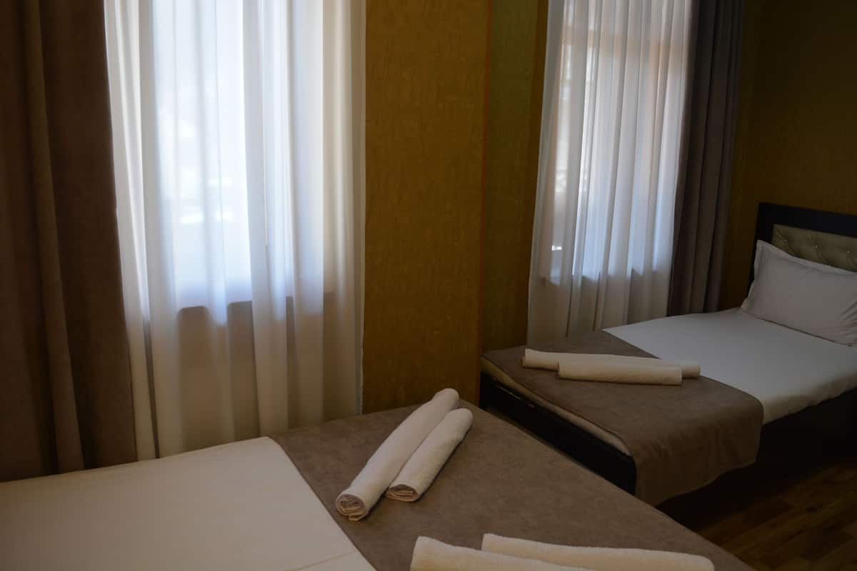 Deluxe Quadruple Room | Desk, WiFi (free), individually furnished