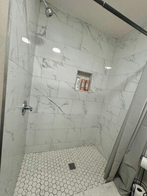 Shower, hair dryer, towels