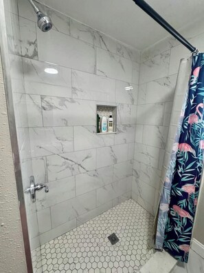 Shower, hair dryer, towels