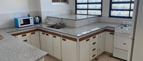 Microwave, oven, electric kettle, cookware/dishes/utensils