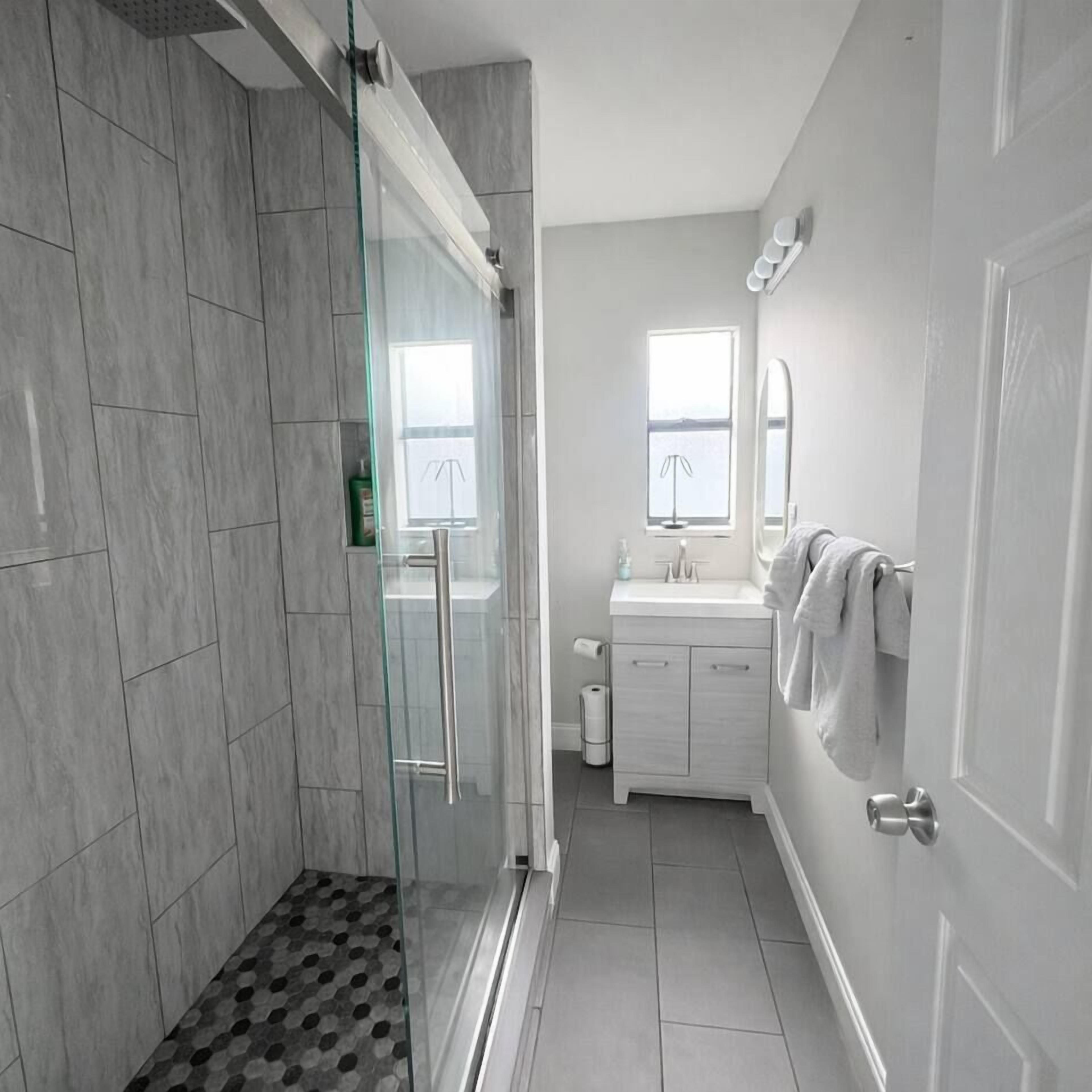 Shower, hair dryer, towels