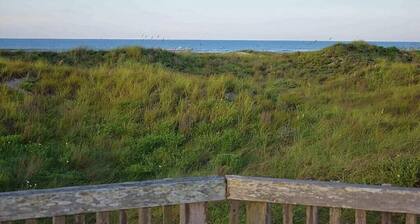 Condo with amazing porch overlooking the beach
