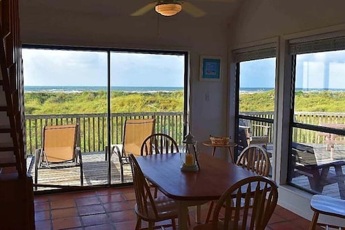 Condo with amazing porch overlooking the beach