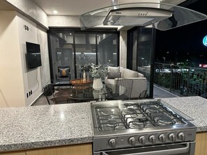 Apartamento Deluxe | Cocina privada