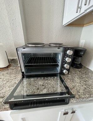 Fridge, microwave, coffee/tea maker, toaster