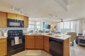 Fridge, microwave, oven, stovetop - Updated, oceanfront, 6th-floor condo with pool, grilling area, & beach access (North Myrtle Beach)