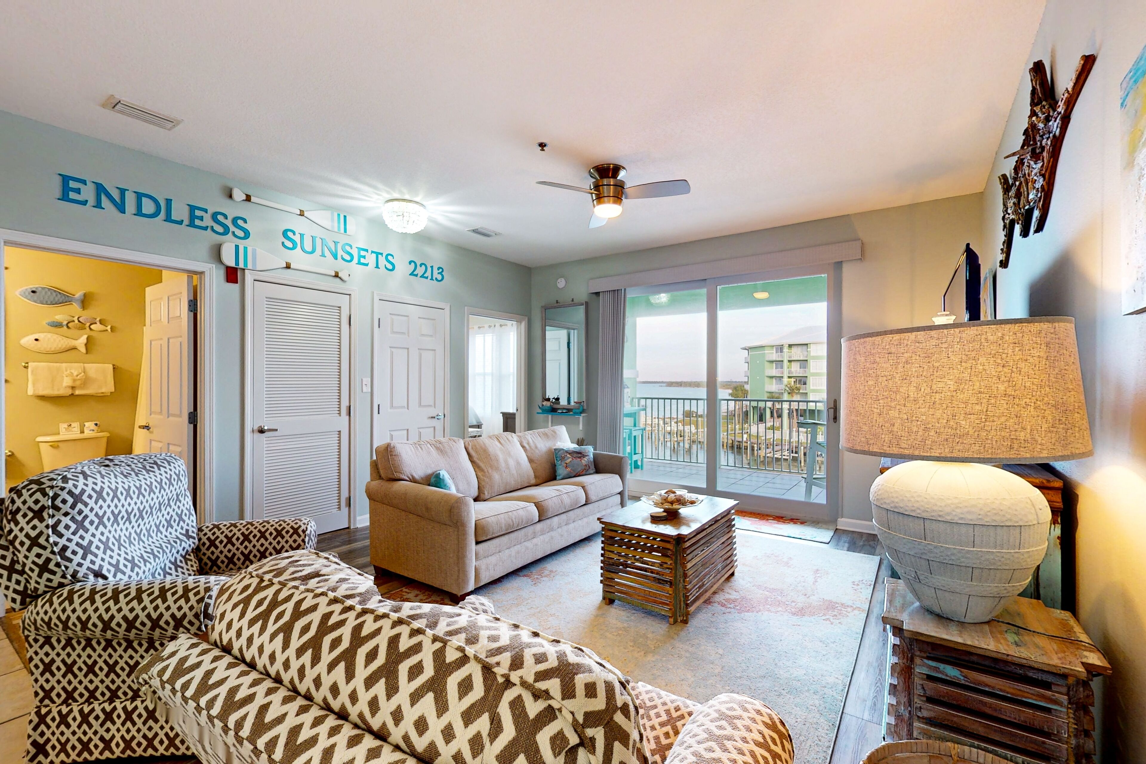 Lovely bay-view condo with hot tub, pool, washer/dryer, boat slip & private dock