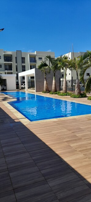 Alberca al aire libre y alberca climatizada