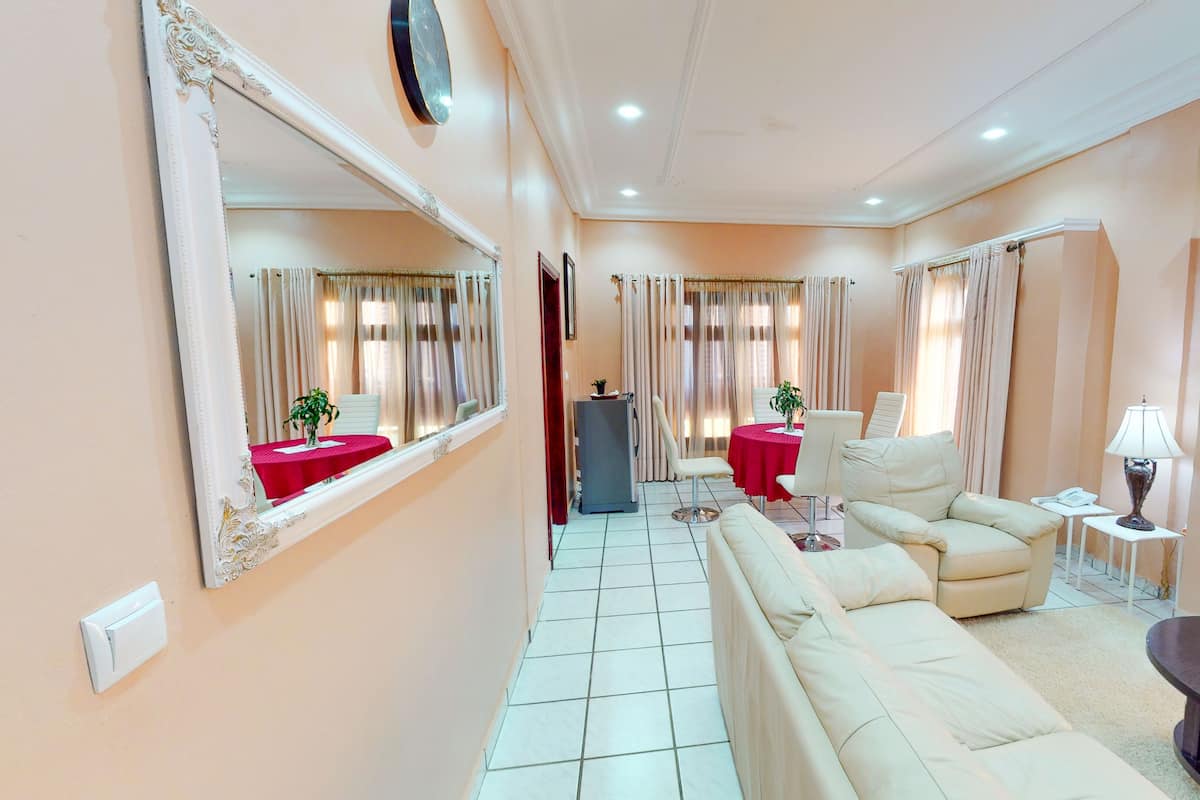 Family Suite | Living area | 42-inch LED TV with cable channels