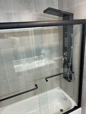 Shower, hair dryer, towels, soap