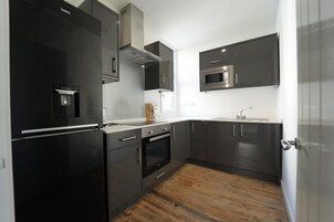 Refrigerador, microondas, horno, placa de cocina