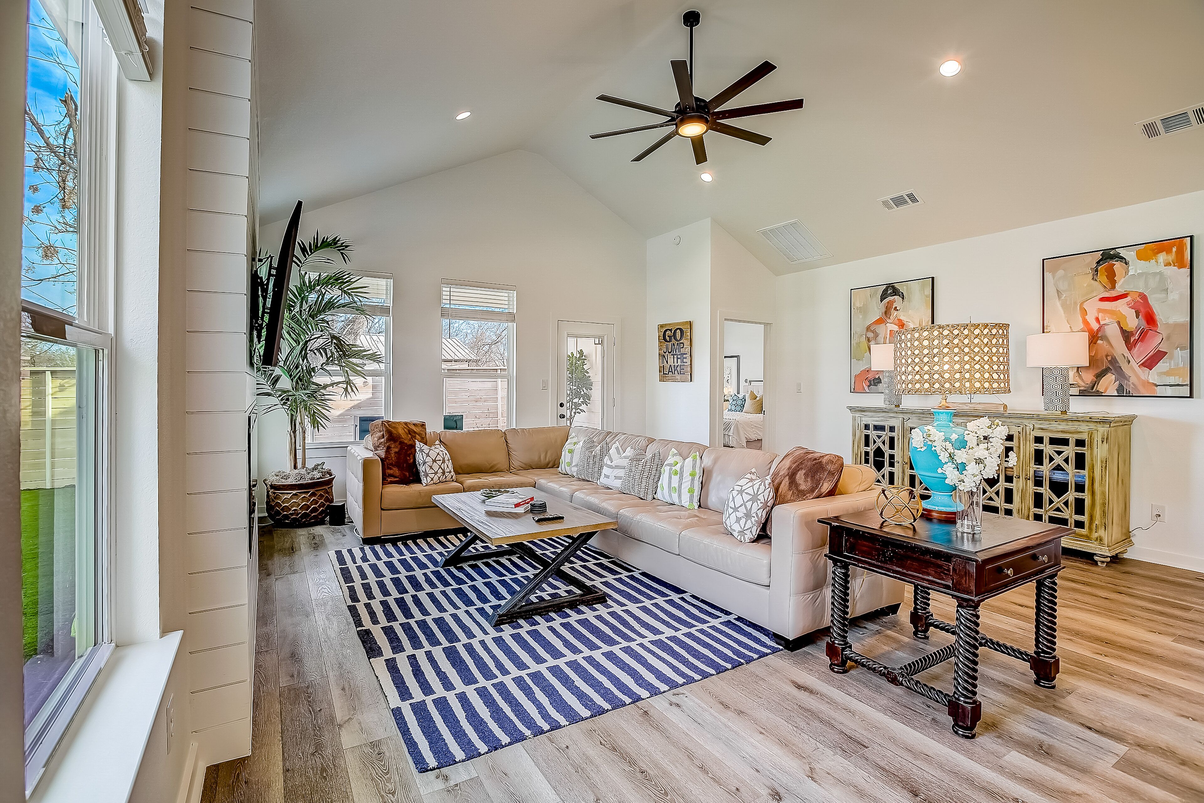 Stylish, two-story home with a firepit, washer/dryer, & central AC