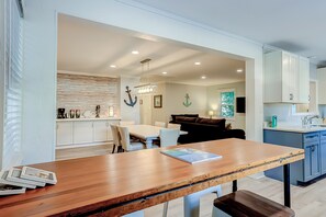Cozy dining area with a wooden table and comfortable seating for meals.