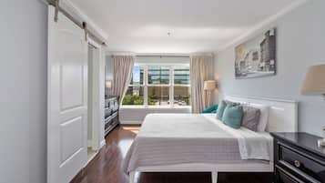 1 bedroom, desk, iron/ironing board, travel crib