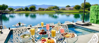"Luxury Lakefront Paradise: Heated Pool Haven with Unrivaled Views"