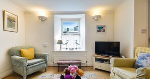 Smart-TV, peis og bøker