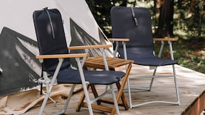 A tent with two folding chairs in front. - Yellowstone Family Tipi sleeps 7, w/ 1 king (Island Park)