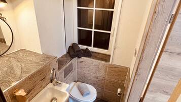 Hair dryer, heated floors, towels, soap