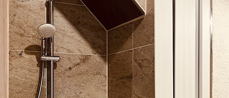 Hair dryer, heated floors, towels, soap
