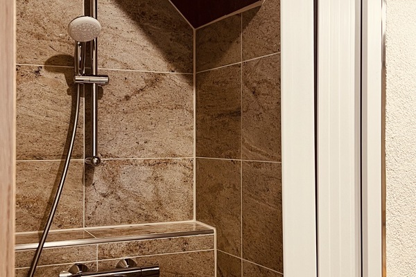 Hair dryer, heated floors, towels, soap