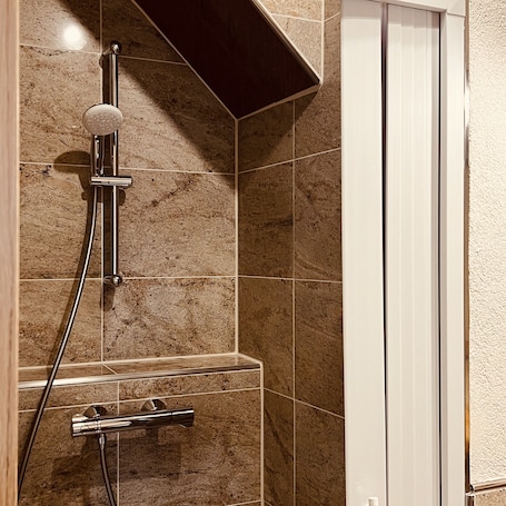 Hair dryer, heated floors, towels, soap. Rose Boardinghouse