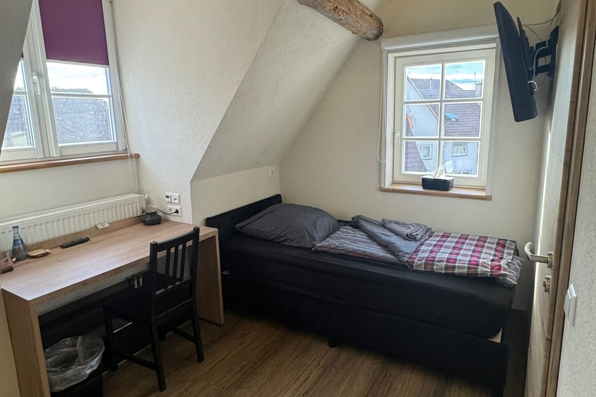 Desk, laptop workspace, free WiFi, bed sheets