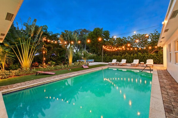 Outdoor pool, a heated pool - Heated Pool-Oversized Master - Close to Beach - Centrally Located 4 Bed / 3 Bath (West Palm Beach)