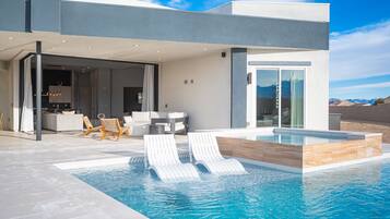 Enjoy a pool and scenic views from the spacious outdoor living area.