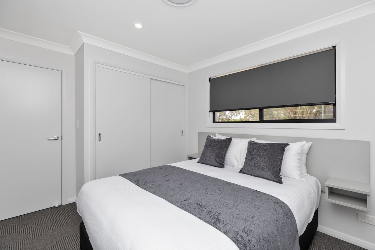 2 bedrooms, desk, laptop workspace, iron/ironing board