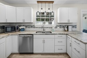 Fridge, microwave, oven, stovetop - RENOVATED BEACH HOUSE WITH PRIVATE POOL.  CLOSE TO THE BEACH! GAME ROOM! (Panama City Beach)