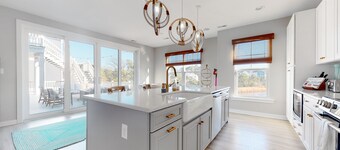 Tidal Walk home with pond views, outdoor pool, decks, fast WiFi, & bikes