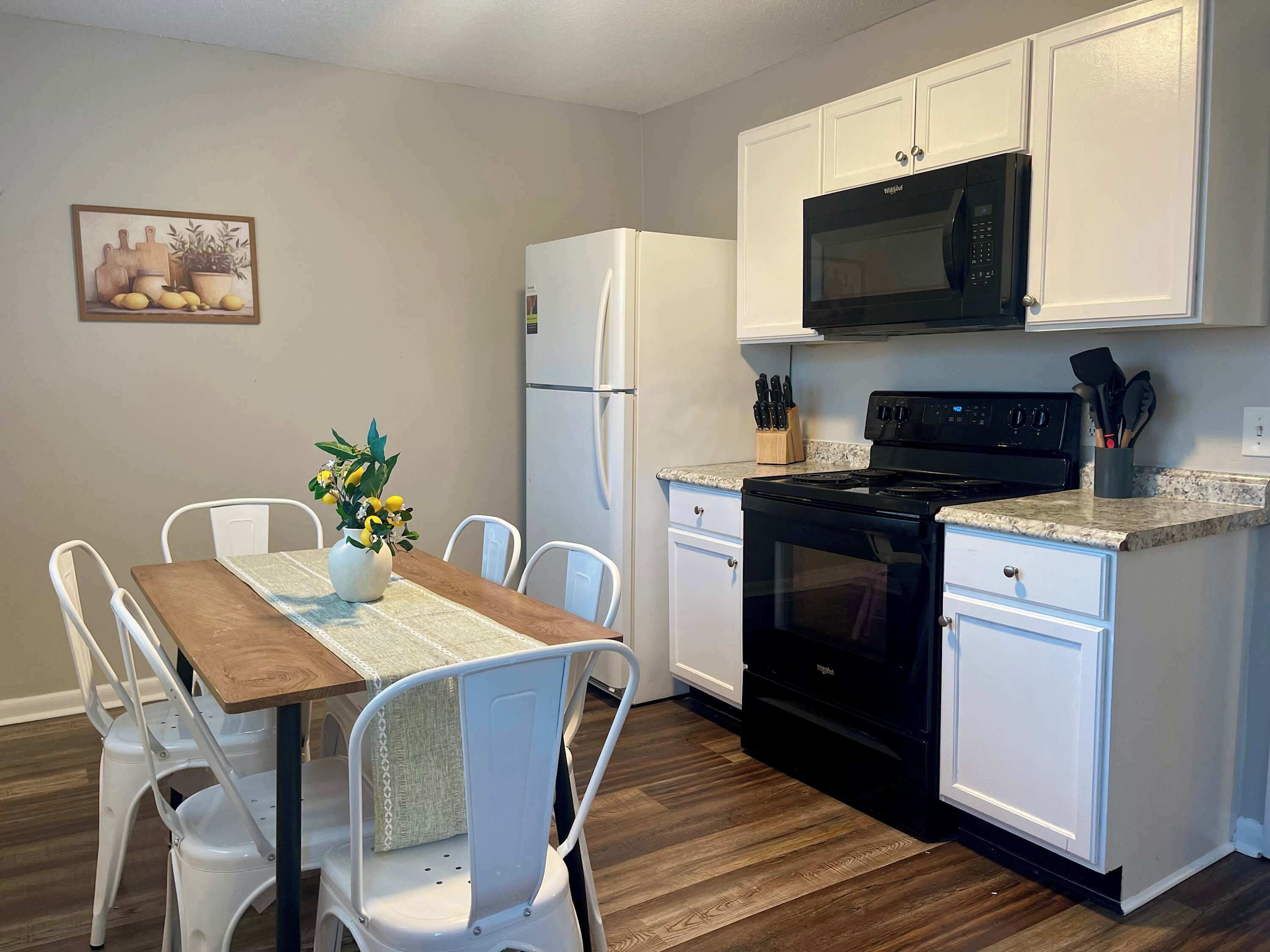 Coffee/tea maker, fridge, microwave, oven