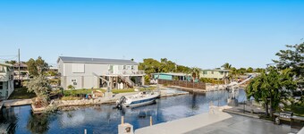 Beautiful waterfront home with central AC, dock, lovely balcony & patio