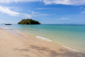 On the beach, white sand
